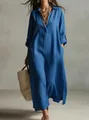 Full-length view of a navy blue cotton linen shirt dress with a relaxed fit and side slits. - Blue