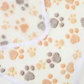 Close-up showing the soft plush texture and cute paw print pattern of pet blanket - Warm White Paw Prints / XS: 40*60 cm