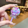 Close-up of purple lollipop liquid sand shaker charm with snowflake glitter and pastel beads - Without Keychain (1 Piece) / Purple Luminous Snowflake Lollipop