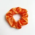 Elegant orange satin silk scrunchie for women, soft elastic hair tie for buns and ponytails. - Bright Orange