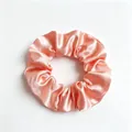 Large elegant peach pink satin fabric scrunchie hair tie with smooth silk-like finish - Sunstone