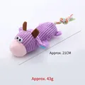 Durable purple corduroy dog chew toy in cow shape with a colorful knotted rope tail - Purple Calf