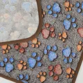 Close-up of soft plush pet blanket with colorful paw print pattern and brown piping - Dark Brown Paw Prints / XS: 40*60 cm