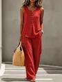 Close-up of red two-piece summer set featuring V-neck sleeveless top and wide pants - S / Top And Bottom / Red