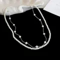 Detail view of a French retro double-layered necklace with pearls and silver beads - Necklace / Silver-White
