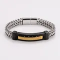 Detail showing the intricate wheat chain and black-gold curved plate of this steel bracelet. - 9.4mm*21.5cm / Steel-Gold Black