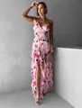 Detail shot of elegant pink floral organza maxi dress featuring layered ruffles and slit - S / Dresses / White