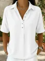 Détails d'un polo blanc en maille gaufrée, manches courtes et boutonnage frontal. - XS / Hauts / Blanc