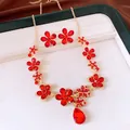 Elegant red flower and teardrop crystal necklace earring set in gold-tone finish - Earrings Necklace Set (HN13695-1) / Gold-Red