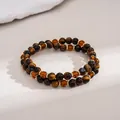 Close-up detail of vintage tiger eye and amber glass beaded bracelet set - Gold, Brown, Long