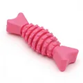 Detaillierte Makroansicht des pinkfarbenen TPR-Hundekauspielzeugs mit Noppen zur Reinigung - Doppelschwanz-Fischgräte / Fuchsia