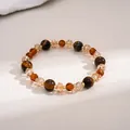 Detailed view of vintage tiger's eye and amber glass beaded bracelet for women - Brown