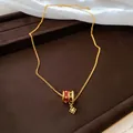 Detailaufnahme einer 24K vergoldeten Halskette mit Zirkon und Blumenanhänger - Anhänger Halskette (5# Rot) / Gold