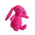 Dettaglio della trama in velluto a coste rosa di un peluche cigolante a forma di coniglio. - Coniglietto