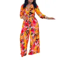 Stylish orange floral two-piece set featuring a tie-waist shirt and wide-leg trousers - S / Top And Bottom / Yellow