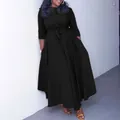 Elegant African plus size black maxi dress with waist tie and long sleeves detail view. - L / Dresses / Black