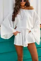 Detailed shot of white two-piece set featuring a loose long-sleeve top and shorts. - S / Top And Bottom / White