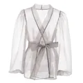 Dettaglio del tessuto in rete trasparente e del laccio in vita di questa camicia grigia Y2K - Taglia S / Top / Grigio
