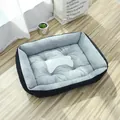 Comfortable grey and black rectangular dog bed featuring a soft white bone shaped pillow - Rectangle Pet Nest (With Bone Pillow) / 60x45cm / Black and Gray