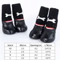 Chaussettes imperméables antidérapantes pour animaux avec motif os et guide des tailles - XS / Os Blanc