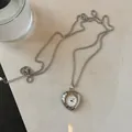 Elegante zilveren hartvormige hanger horloge ketting met een gladde metalen ketting - Hart / Zilver