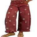 Close-up detail of Y2K vintage wine red wide leg jeans with floral print and ruffle hem - S / Bottoms / Rose Red