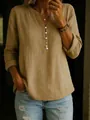 Detailed view of women's cotton linen long sleeve V-neck top with button accents - Khaki