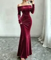 Close-up of elegant burgundy velvet off-shoulder floor-length dress with ruched waist - S / Dresses / Burgundy