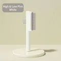 Minimalist white cat grooming brush featuring dual-length teeth for professional de-shedding - Long and Short Teeth / White