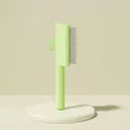 Green self-cleaning slicker brush for pets with high and low stainless steel teeth - Long and Short Teeth / 19x7cm / Green