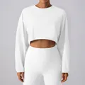 Women's minimalist white long sleeve crew neck crop top sweatshirt for yoga and sports - S / Tops / White