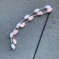 Interactive cat teaser wand with pink and white pom-pom tassels and a long black rod - Pole Length Approx 52cm / Pink White