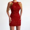 Close-up detail of a red sequined bodycon dress with elegant gold shoulder chains. - Red