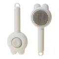 Rabbit ear pet grooming brush with stainless steel needles in white finish - Pet De-shedding Comb / White