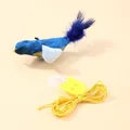 Interactive blue bird cat toy with feathers, elastic cord and yellow suction cup - Blue