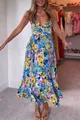 Detail of a multi-colored floral V-neck pleated camisole maxi dress on a model. - S / Dresses / Blue