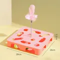 Interaktives rosa Katzen-Puzzlespielzeug mit rosa Teaser-Feder und bunten Glockenbällen - Quadratische Puzzle-Box / Rosa