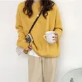 Pull rétro en tricot à col rond et coupe ample pour femme en jaune gingembre - Taille unique / Hauts / Jaune