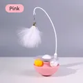 Interactive pink cat tumbler toy with white feathers and bell attachment - Pink