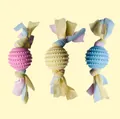 Durable candy-shaped TPR dog chew toys with colorful fabric strips in pastel pink yellow blue - Spiky Ball with Cloth Strip / 17cm
