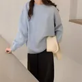 Pull élégant en maille bleu clair à col rond et coupe oversize au style rétro minimaliste - Taille unique / Hauts / Bleu clair