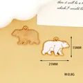 Detailed view of a polar bear enamel charm with 21mm and 15mm size measurements - Polar Bear