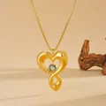 Macro view of gold-plated stainless steel heart pendant with green evil eye detail - Gold Hollow Heart Green Evil Eye Style (F314-8)