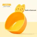 Yellow cat-shaped pet food scoop with built-in desiccant compartment for freshness - Orange