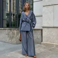 Elegant blue tencel ruffle two-piece set featuring a wrap top and flowing wide leg pants - S / Top And Bottom / Blue
