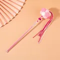 Interactive cat teaser wand toy featuring pink plush pom-poms and ribbon tassels - Pink White Balls With Pink Tassels