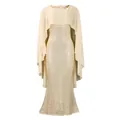 Elegant champagne evening gown featuring a sequined body and flowy chiffon cape overlay. - S / Dresses / Champagne