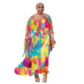 Detail of the vibrant off-the-shoulder printed maxi dress showing its colorful pattern. - 0XL / Dresses / Colorful