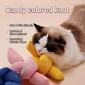 Juguete de nudo de peluche de colores para gatos con papel crujiente para morder - Color Aleatorio
