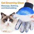 Blauer Haustier-Pflegehandschuh zur effektiven Haarentfernung und Massage für Tiere. - Linke Hand / Blau